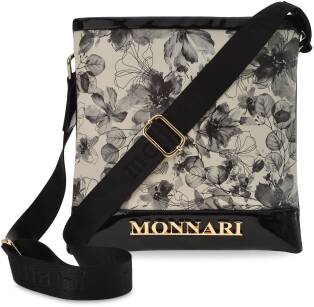 Dámská černá kabelka listonoška taška monnari na dokumenty přes rameno s květinami